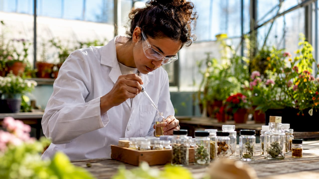 Scientist preparing bioactive skincare ingredient in lab